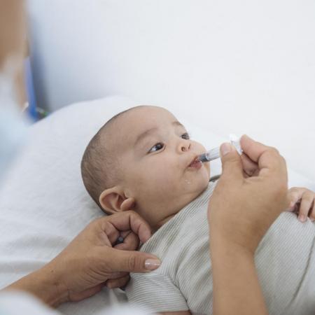 baby receives vaccines in Venezuela
