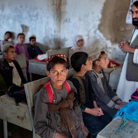 boy sits in school