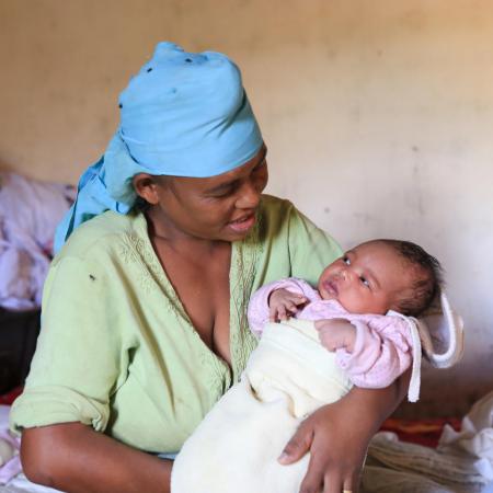 mother holds baby in Madagascar