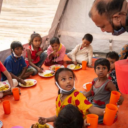 Children from the Child Protection Service Hub having their lunch