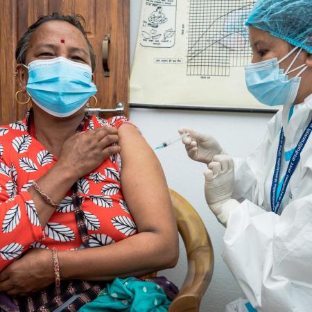 On 22 July 2021 at the Dapcha Health Post in Kavre District in central Nepal, 53-year-old Bijuli Devi Tamang receives the Johnson & Johnson COVID-19 vaccines donated to Nepal through the COVAX Facility. 