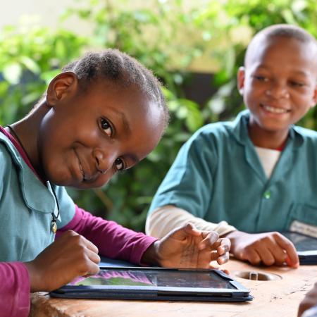 Children learn with tablets and computers in the Public Melen School of Yaoundé, the capital of Cameroon.