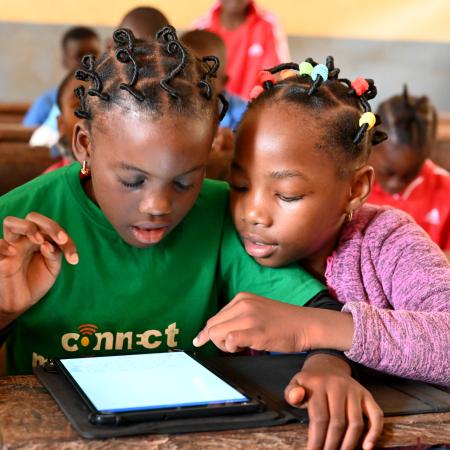 Children learn with tablets and computers in the Public Melen School of Yaoundé, the capital of Cameroon.