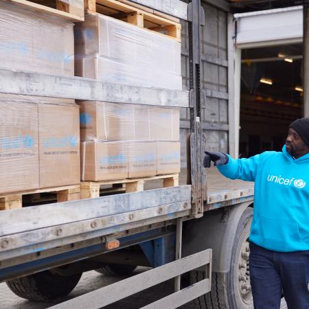 On 6 March 2022, a UNICEF staff inspects supplies that have just arrived in Lviv, western Ukraine, from UNICEF’s Global Supply and Logistics Hub in Copenhagen.