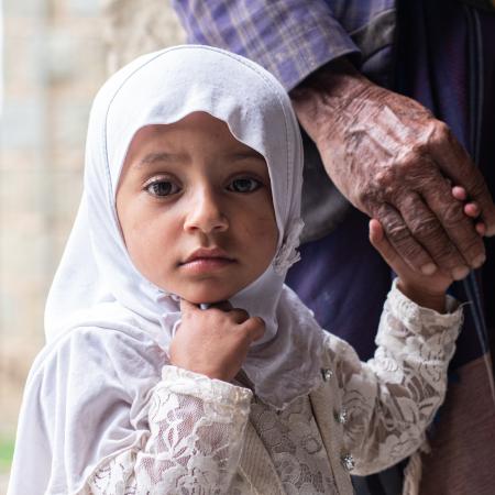 Somaya, 2 years old, is one of the children who came with her father, Walid Mohammed Ahmed Hassan, to get medical attention from the mobile clinic in Mazhar District, Raymah Governorate.