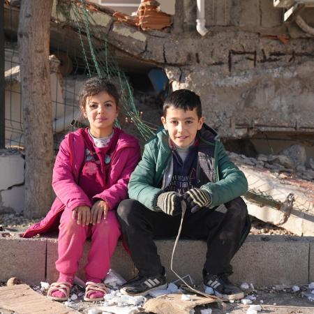 Two friends reuniting after the earthquake in Hatay.