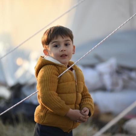 A boy at the temporary shelter set up for the survivors of the 7.7 magnitude earthquake in Kahramanmaraş, Türkiye.