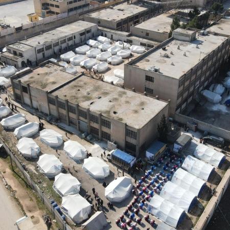 This aerial photograph shows tents at a temporary shelter for people affected by the earthquakes.