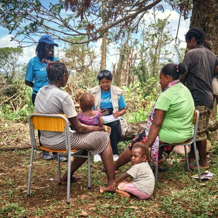 Sheenal & Esther, UNICEF staffs speaking with mothers who live in Red Graon community at Teouma.