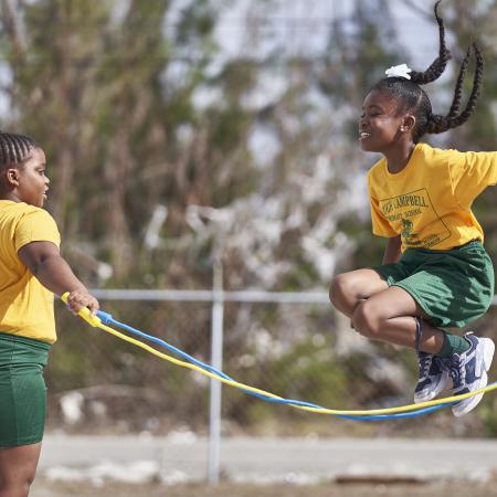 On 11 December 2019 in The Bahamas, girls jump rope during a break at Hugh H. Campbell Primary School in Freeport.