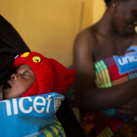 Grandmother Mampu Drami hold her grandson Mohamed after his mom Mohamed Mama Drami (34) who gave birth to twins two weeks ago at the paediatric ward in the Bafata hospital, Guinea Bissau, Thursday,17 January 2020. Unicef support the hospital by providing nutrition counselling, prevention and treatment of nutrition , HIV family testing and birth registration. Unicef Photo/Prinsloo