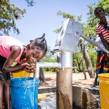 On 26 January 2020, Christine, 7, collects water from a recently rehabilitated water point in Gwembe Valley, Zambia. Severe and prolonged drought in the region have contributed to depleted water points, crop failure, food insecurity and malnutrition, impacting the health of mothers and children. To date, under the Zambian Government's drought response plan, UNICEF has supported the rehabilitation of a dozen existing boreholes in Gwembe District. In total, UNICEF will drill 100 new boreholes and rehabilitate