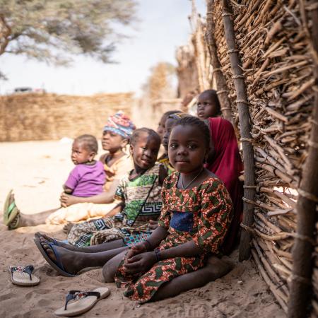 Children sitting on the ground