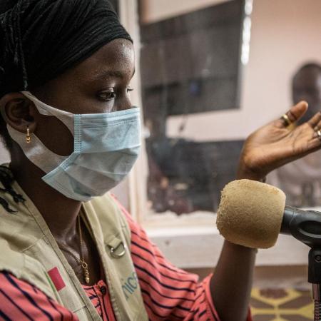 A youth advocate speaks on a radio programme.