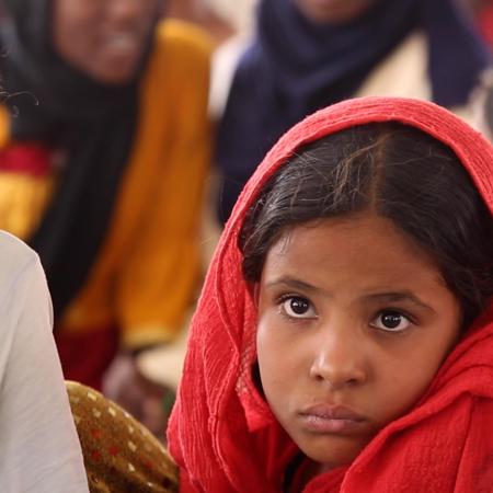 A portrait of a young girl at a Child Friendly Space (CFS) supported by UNICEF in Atbara, Sudan.