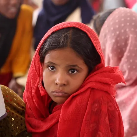 A portrait of a young girl at a Child Friendly Space (CFS) supported by UNICEF in Atbara.