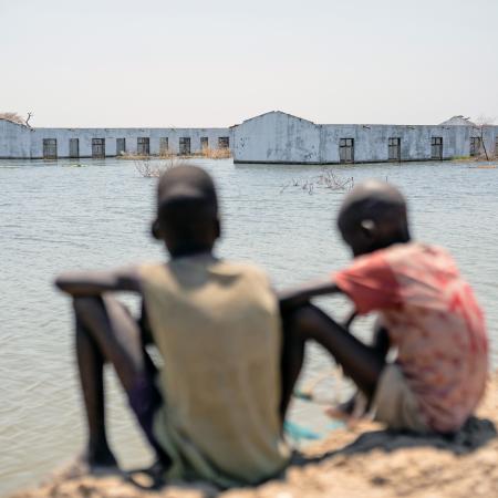 On 4th March 2023, boys look out over their flooded school in Bentiu, Unity State, South Sudan.