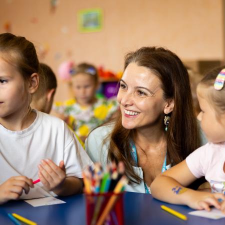 Regina De Dominicis, UNICEF Regional Director for Europe and Central Asia, is communicating with preschool children during her visit to "Lisova Pisnya" - one of the kindergarten, supported by UNICEF.