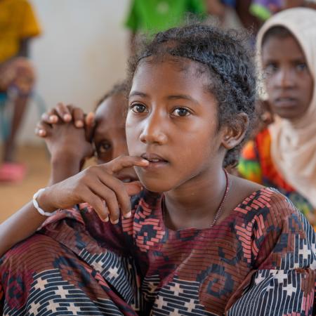 A displaced girl takes part in remedial classes to prepare for the return to school in the BAWA displaced person site