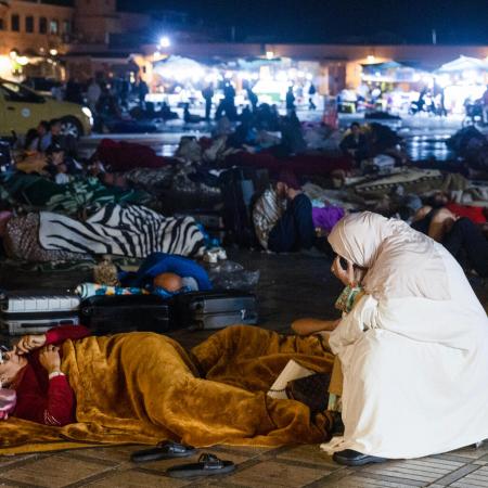 Residents stay out at a square in Marrakesh on September 9, 2023, after an earthquake.