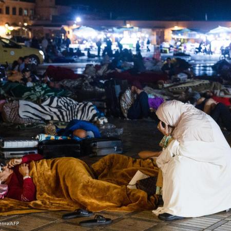 Residents stay out at a square in Marrakesh on September 9, 2023, after an earthquake.