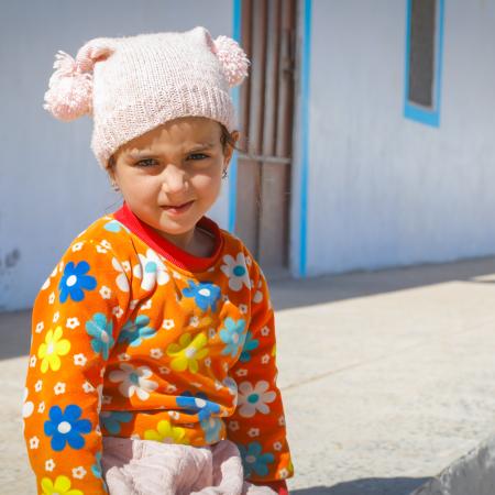 Three-year-old Loli Abdel Qader stands at the UNICEF-supported mobile clinic in Yemen. 