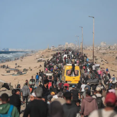 Families moving along the coastal road back to northern Gaza.