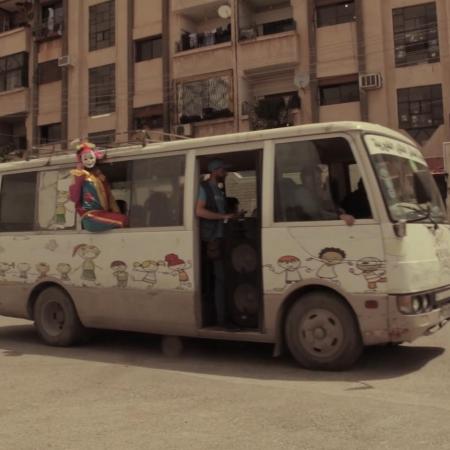 The Corona Van as it drives through the streets in Al Tal.