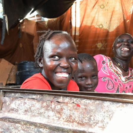 Khamisa smiles with her two youngest children