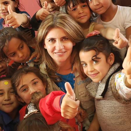 Bayan with students at a makani centre