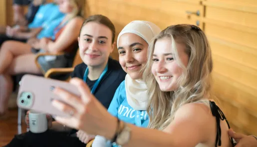 Girls gathering on a college campus.