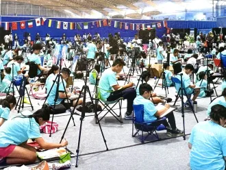Children painting during a painting olympics in Vancouver. 