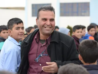 Mr. Ahmad Alshawi with students.