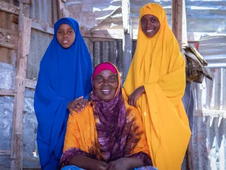 Habiba (Center) with her two children Hawa and Aniso pose for the photo in Xaar-Xaar south of Galkayo in Galmudug State of Somalia.