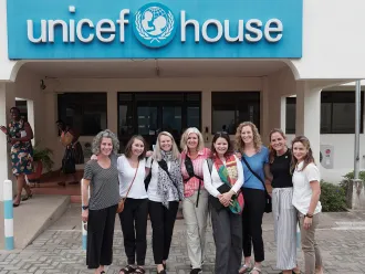 Members of the Women UNlimited team pose outside UNICEF Ghana offices