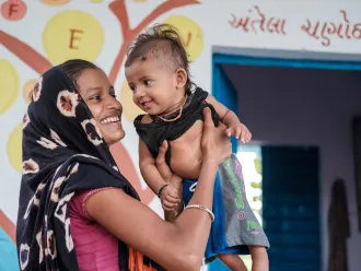 A happy Naina Patel with her daughter at Mamta Diwas(VHND) at Chanota Fadia, AW Baria, Gujarat as routine immunisations and checkups resume post covid lockdown