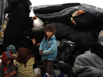 Families are welcomed into tents in the reception area of Al-Hole camp, in Syria. December 2018