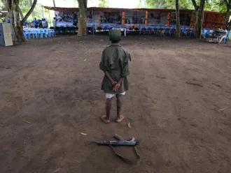 A former child soldier takes part in a reintegration ceremony.