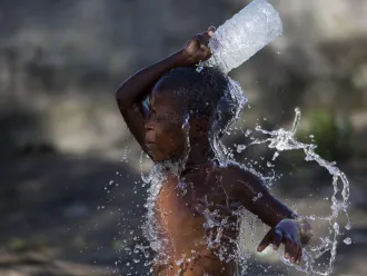boy washes himself