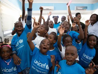 Children in Cote D'Ivoire celebrate Easter at a UNICEF sponsored event.