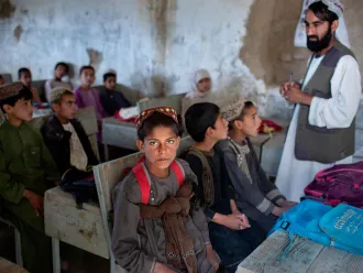 boy sits in school