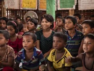 Rohingya Children recite daily lesson at a UNICEF learning space in Bangladesh