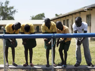 Children wash their hands at a UNICEF supplied WASH station