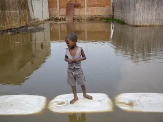 On 4 March 2021, a child plays in the floodwaters in Gatumba, located near Bujumbura in Burundi. At least 50,000 people have been affected by the floods in the region in the past year. A few kilometres from the floodwaters, a big IDP camp has been formed to shelter people displaced by the flooding. Burundi is extremely vulnerable to climate change and climate change -triggered natural disasters- and as one of the poorest countries in the world, it has very little means to protect its population.