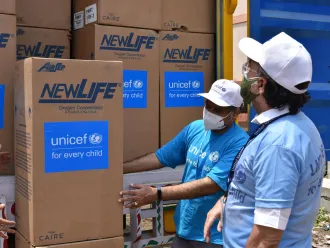 Officials from UNICEF Bihar office present at Fatuha Warehouse, monitoring the unloading of the life-saving medical helps.
