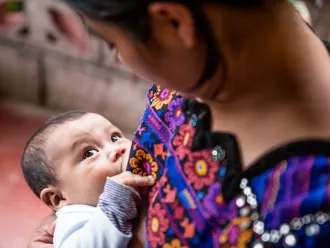 On October 16, 2019, Eva Ramírez a woman of the community of Chicoy, Todos Santos, Huehuetenango, Guatemala is breastfeeding her son, Junior Chales Ramírez (16 months old).