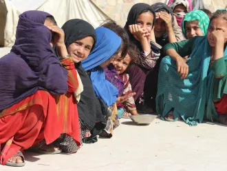 Group of children who left their hometown and are now in an IDP camp in Kandahar