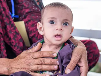 At the UNICEF-supported Inpatient Therapeutic Feeding Centre in Herat Regional Hospital, 15-month-old Javid who is suffering from severe acute malnutrition (SAM) with complication is provided with therapeutic food and medical care.