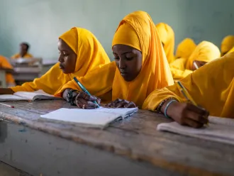 Students work on an in-class exercise at Darwish Primary School in Garowe, Somalia.