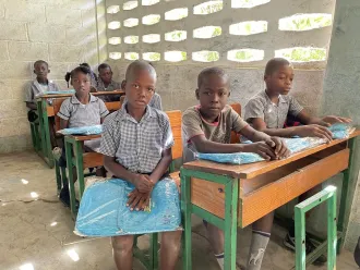 UNICEF distributing school kits
